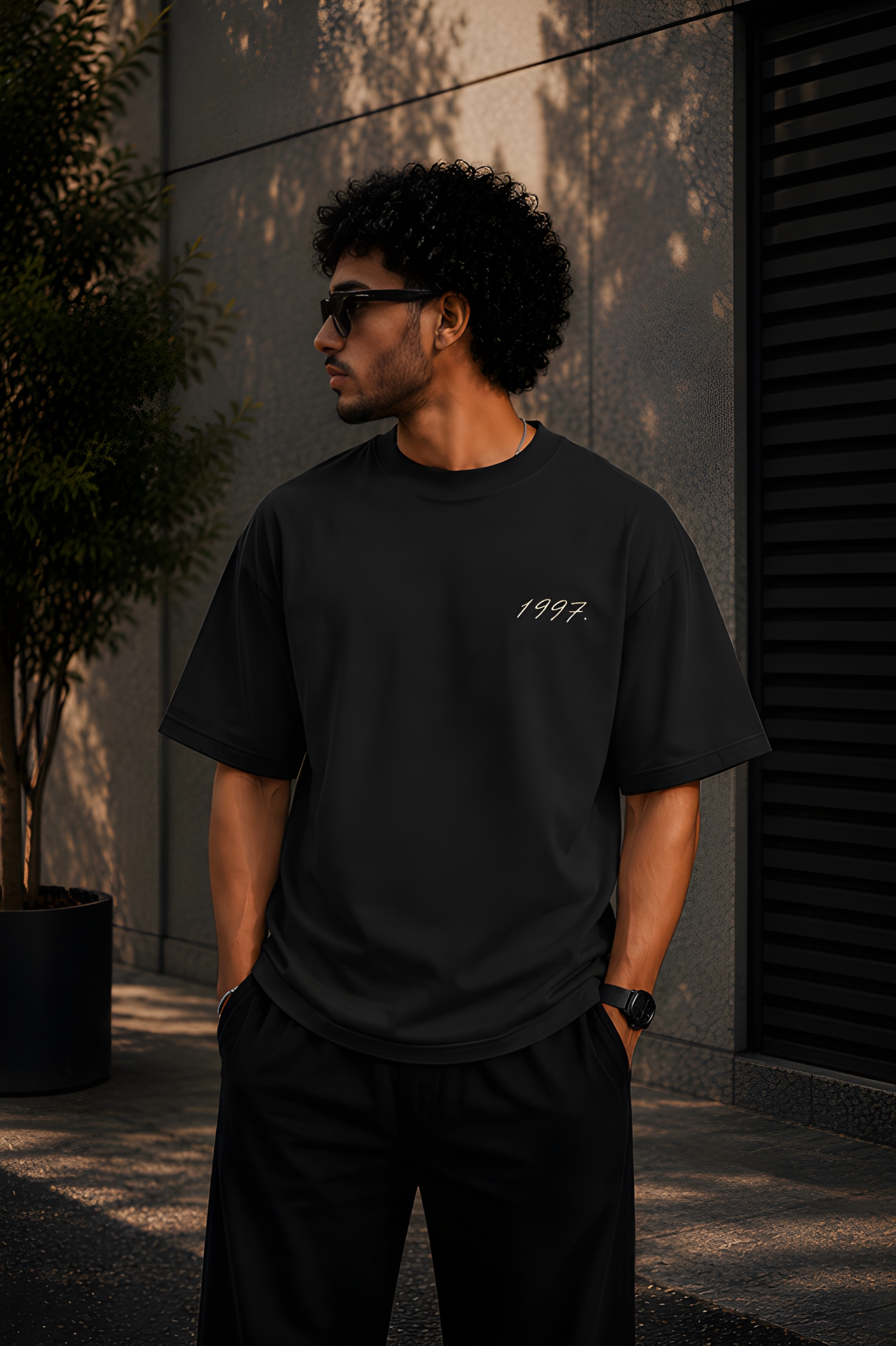 Antim 1997 Oversized Black Drop Shoulder T-Shirt Front View Male Model Streetwear India
