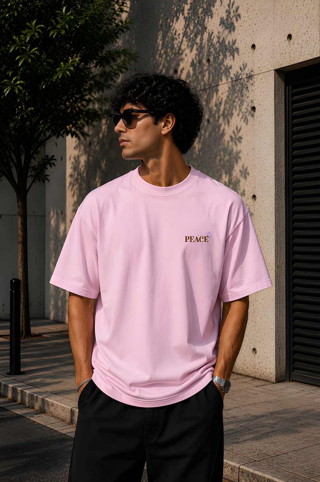 Antim Dont Waste Your Energy Oversized Pink T-Shirt Front View Male Model Sunglasses Outdoor Streetwear India